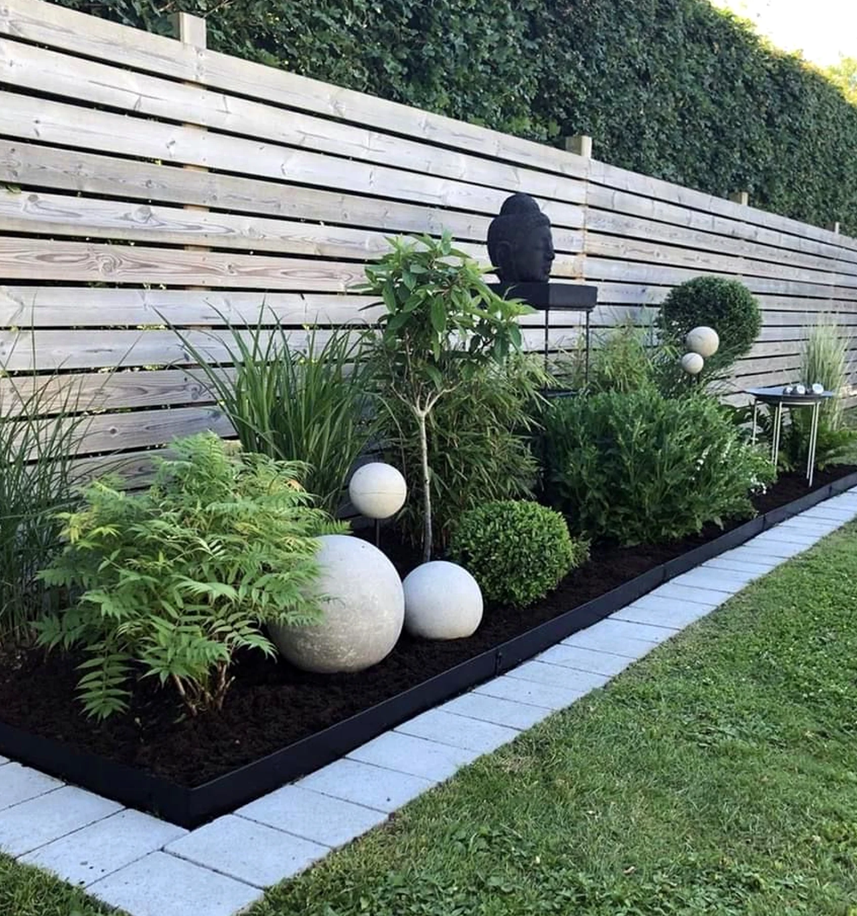 Soft floor pattern brings order to the outdoor space, creating a mood that feels visually grounded.