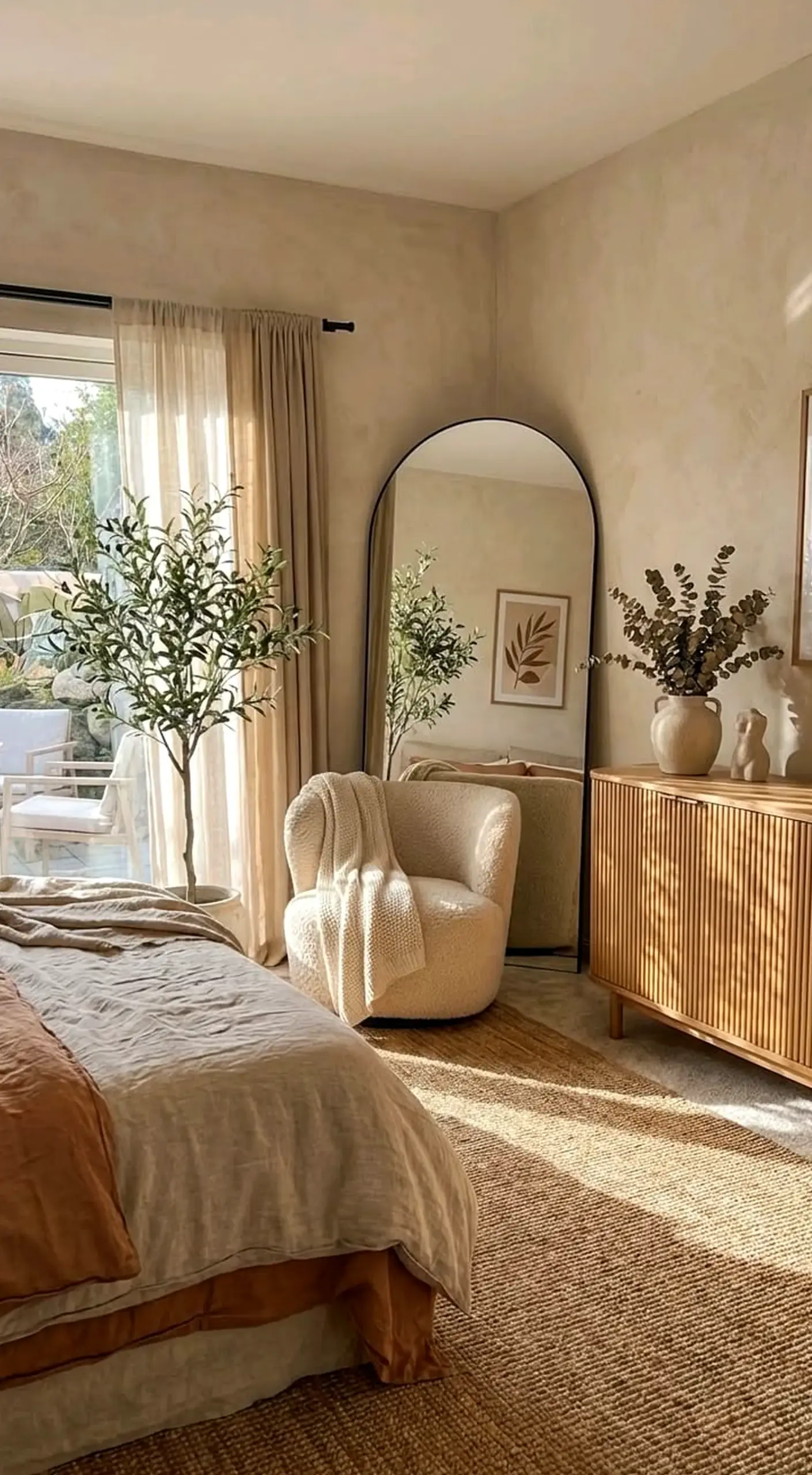 Relaxed porch bench draws attention to shape while the outdoor space stays bright but not busy.