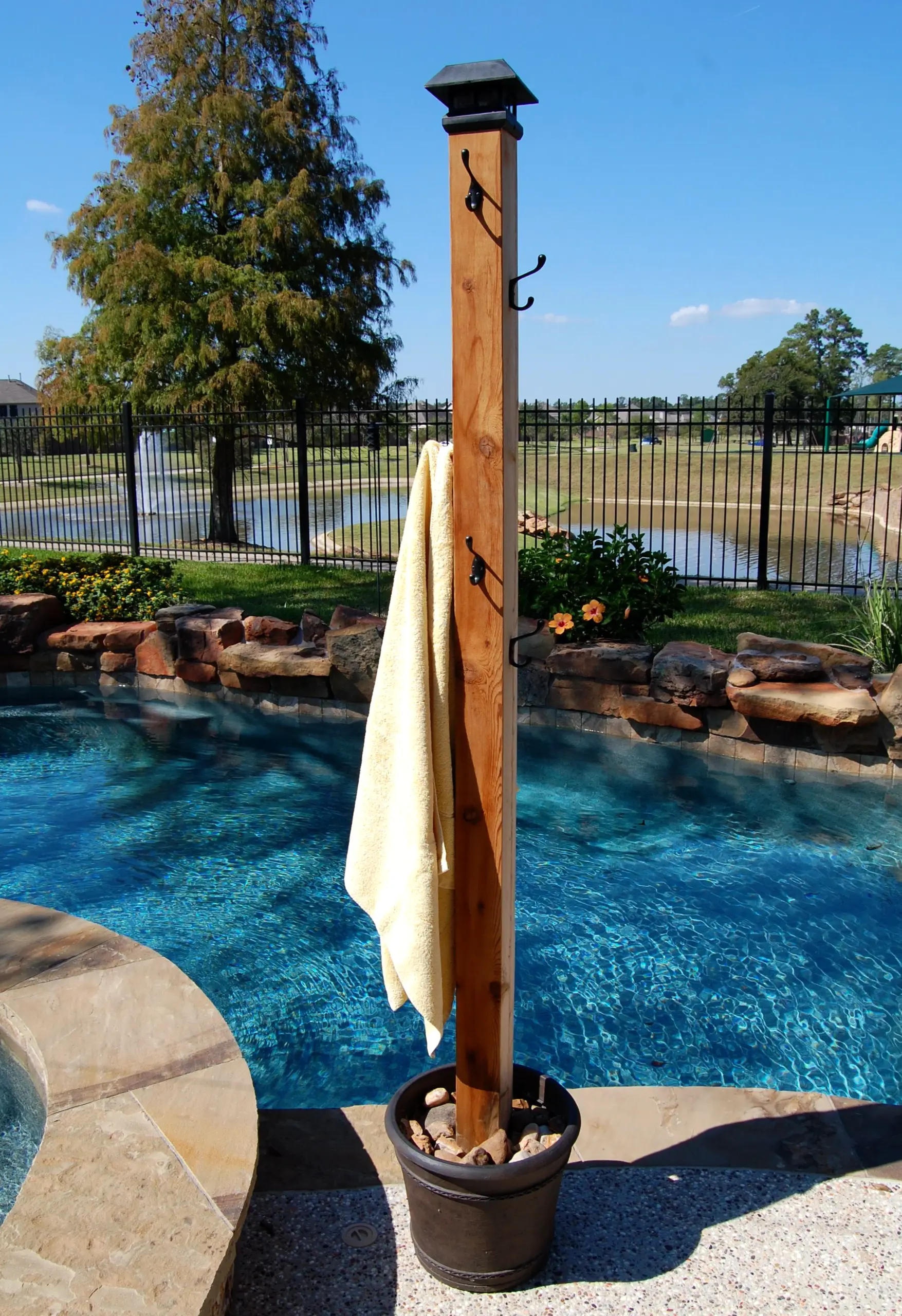 Colorful outdoor lounge anchors the arrangement with depth, giving the view a mood that feels pleasantly composed.