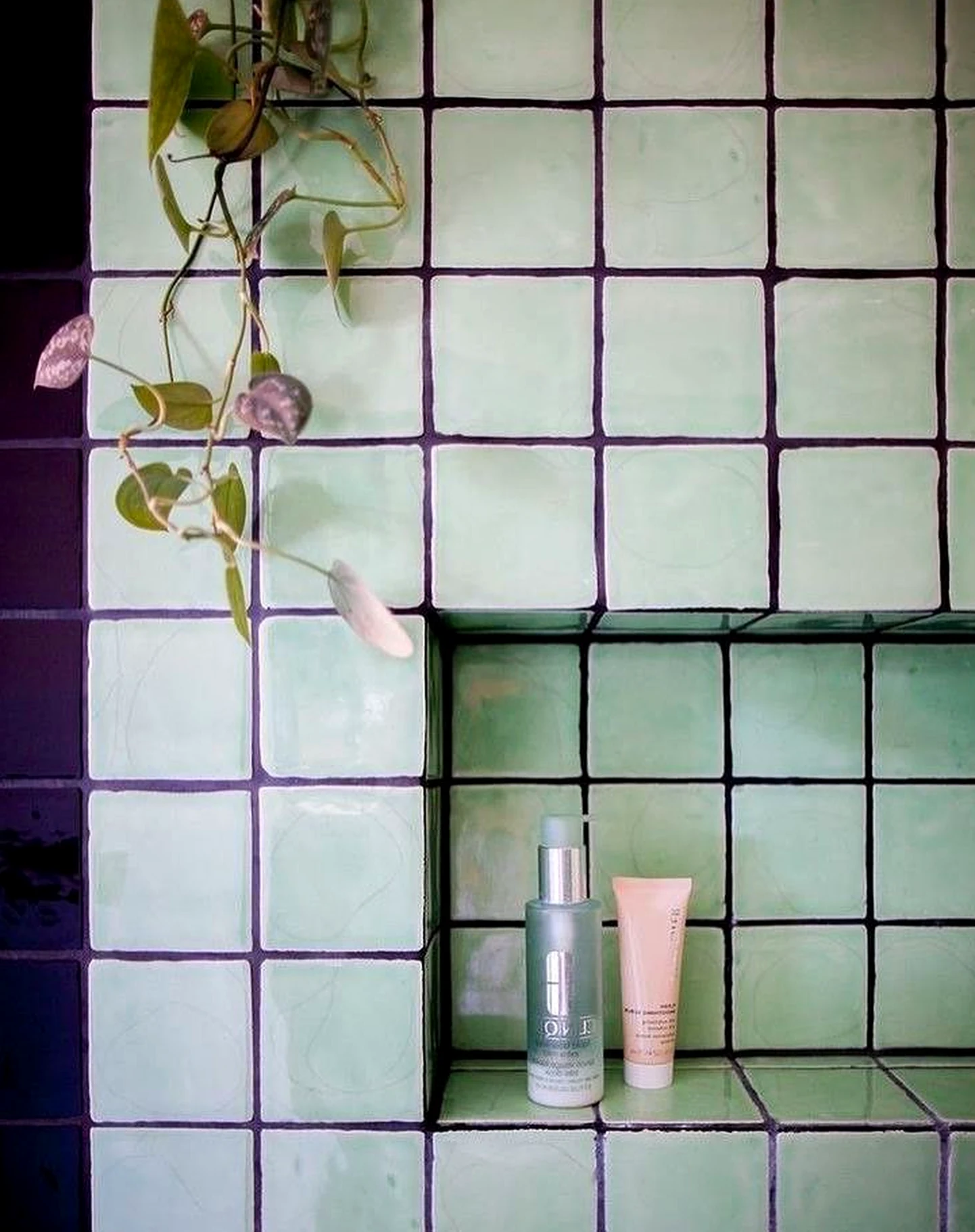 Tactile green entry brings a useful note of rhythm, making the corner feel personal and relaxed.